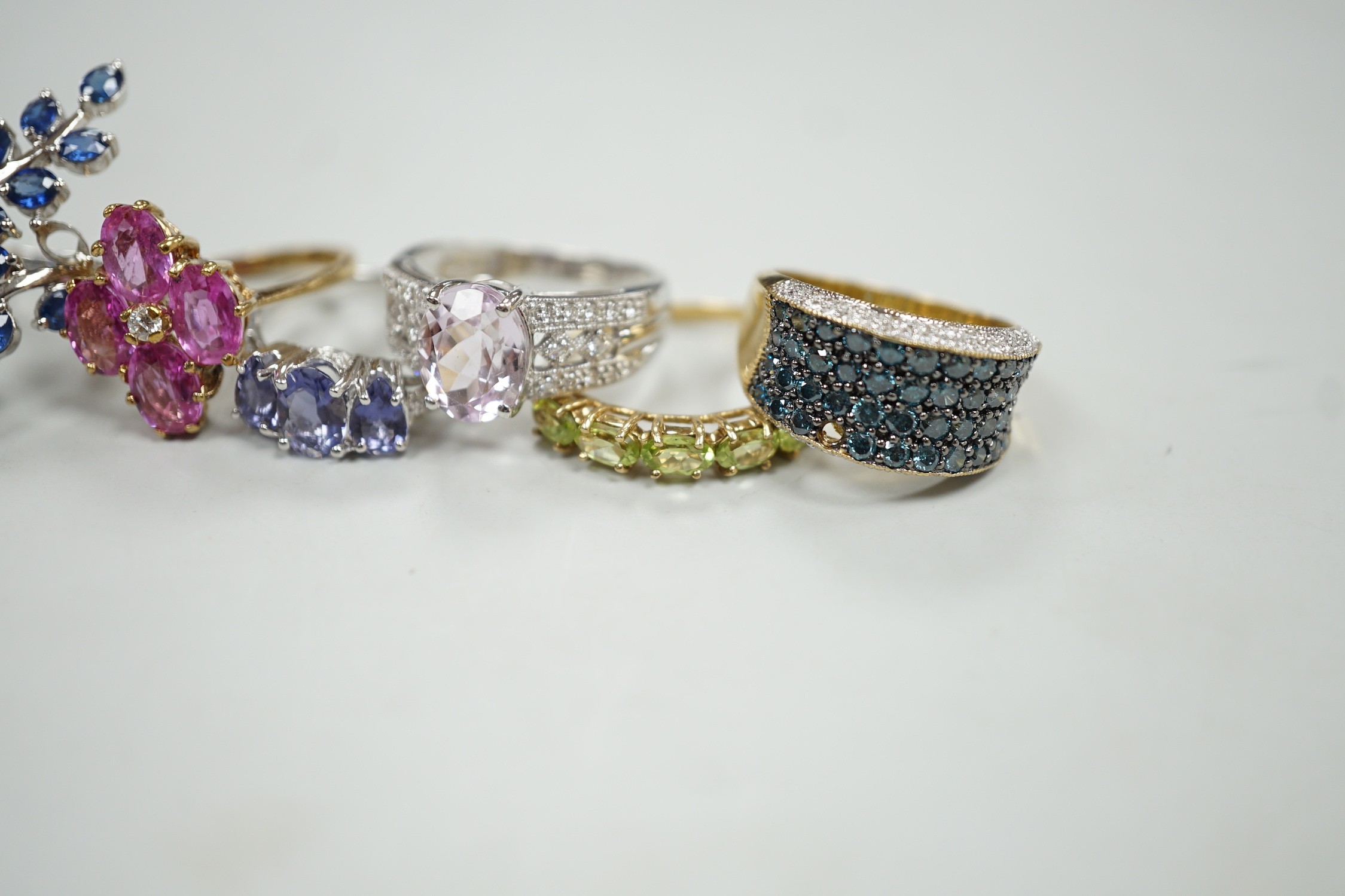Six assorted modern 9ct gold and gem set dress rings, including three white gold, gross weight 20 grams.